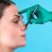 clínicas de rinoplastia en Las Palmas - cirujano dibujando la líneas para realizar una rinoplastia en Las Palmas en la nariz de una mujer